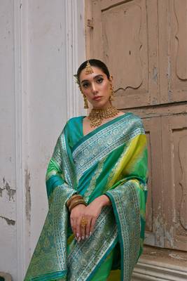 Green banarasi silk blend blend weaving saree with zari woven fancy tassels 2