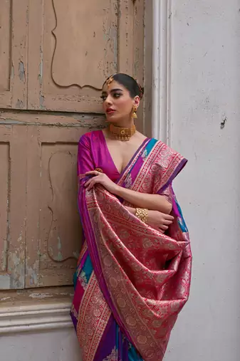 Pink banarasi silk blend blend weaving saree with zari woven fancy tassels