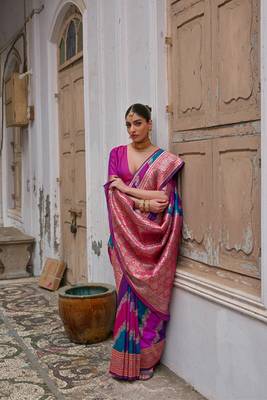 Pink banarasi silk blend blend weaving saree with zari woven fancy tassels 3