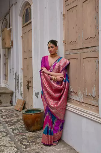 Pink banarasi silk blend blend weaving saree with zari woven fancy tassels