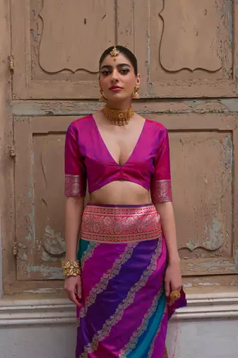 Pink banarasi silk blend blend weaving saree with zari woven fancy tassels