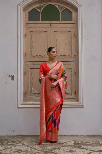 Red banarasi silk blend blend weaving saree with zari woven fancy tassels