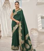 Green banarasi soft silk blend woven jacquard saree with blouse piece