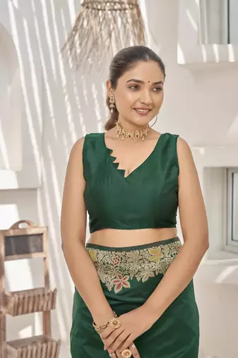Green banarasi soft silk blend woven jacquard saree with blouse piece