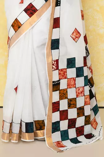 White exclusive applique saree without blouse piece 
