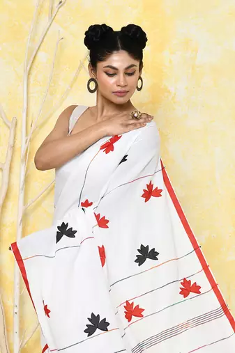 white exclusive applique saree with blouse piece