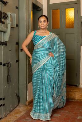 Turquoise blue chiffon stripes leheriya print zari work lace border saree with unstiched blouse piece 1