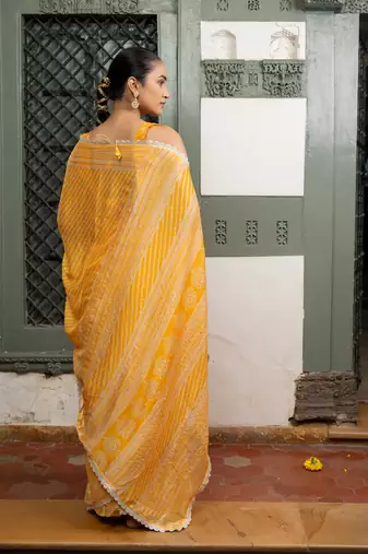 Yellow chiffon stripes leheriya print zari work lace border saree with unstiched blouse piece