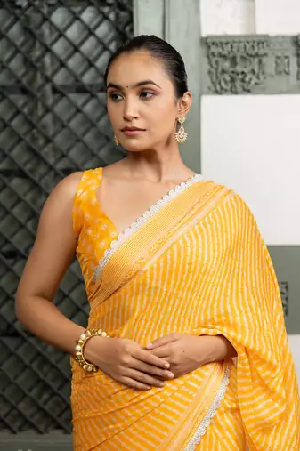 Yellow chiffon stripes leheriya print zari work lace border saree with unstiched blouse piece