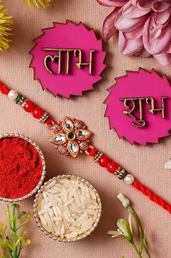 Stone Flower Rakhi For Brother With Shubh Labh Sticker 