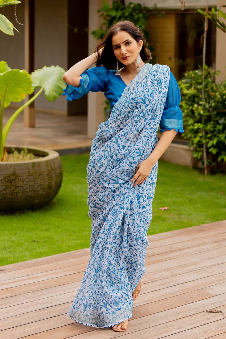 White cotton blend warli print pom pom lace border saree with unstiched blouse piece