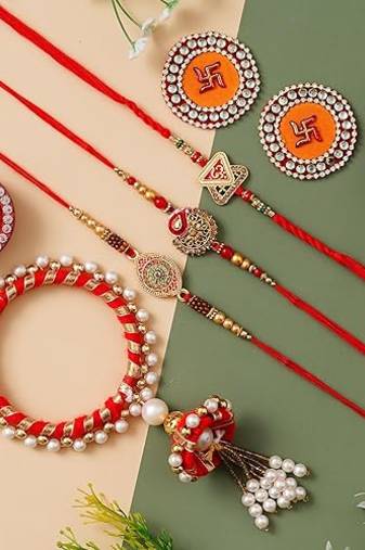 Combo Of 4 Rakhi Set For Bhaiya And Bhabhi With 2 Swastik Wall Sticker 