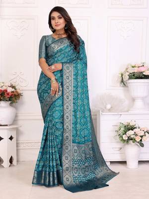 Blue soft satin silk blend bandhej print saree with kanchi zari weaving border 1