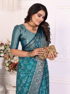 Blue soft satin silk blend bandhej print saree with kanchi zari weaving border 3