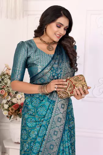 Blue soft satin silk blend bandhej print saree with kanchi zari weaving border
