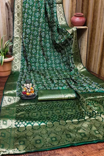 Dark green soft satin silk blend bandhej print saree with zari weaving border