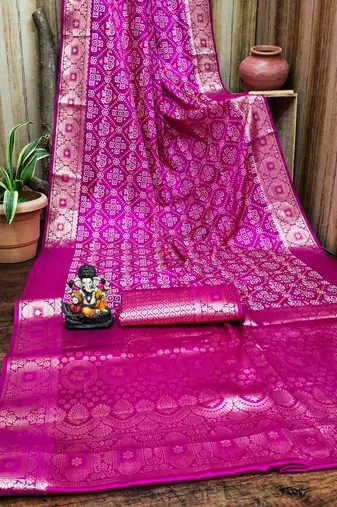 Pink soft satin silk blend bandhej print saree with kanchi zari weaving border