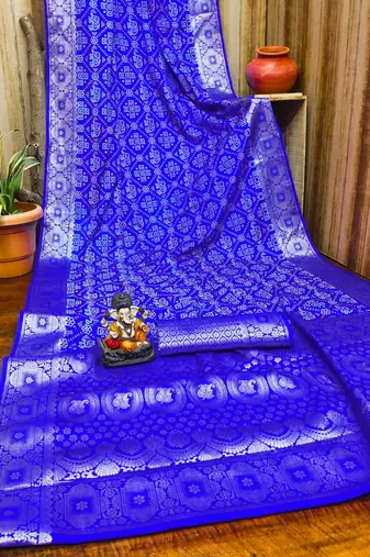 Blue soft satin silk blend bandhej print saree with kanchi zari weaving border