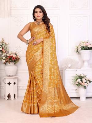 Yellow soft satin silk blend bandhej print saree with kanchi zari weaving border 1