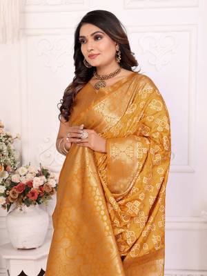 Yellow soft satin silk blend bandhej print saree with kanchi zari weaving border 3