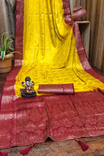 Red and yellow satin silk blend saree with contrast zari woven borders