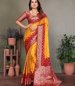 Yellow handmade bandhej satin silk saree with zari weaving border