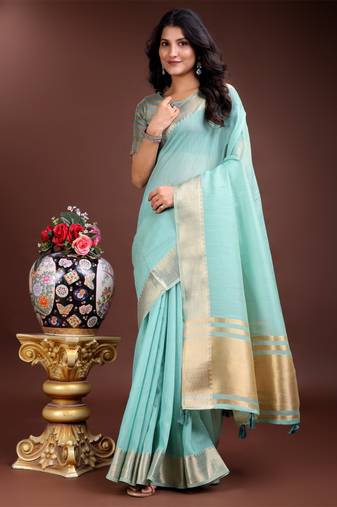 sea green organza woven zari work tassel saree