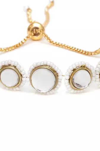 Golden circular kundan with white pearls adjustable bracelet
