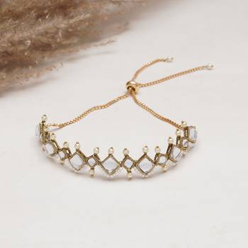 Golden kite shaped kundan with white pearls adjustable bracelet 1