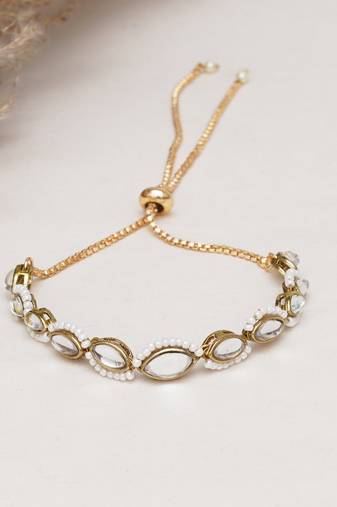Golden oval shape kundan & white pearl adjustable bracelet