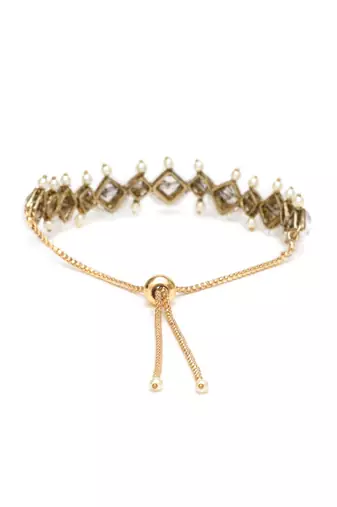 Golden kite shaped kundan with white pearls adjustable bracelet