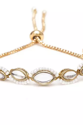 Golden oval shape kundan & white pearl adjustable bracelet
