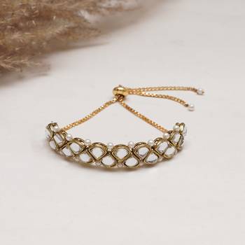 Golden triangle kundan with white pearls adjustable bracelet 1