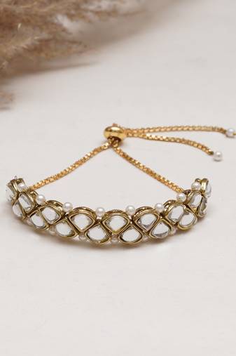 Golden triangle kundan with white pearls adjustable bracelet