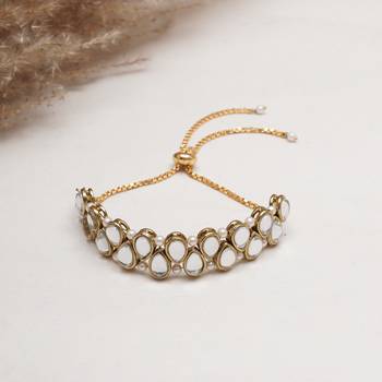 Golden double layer tilak kundan with white pearls adjustable bracelet 1