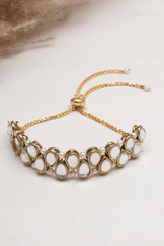 Golden double layer tilak kundan with white pearls adjustable bracelet