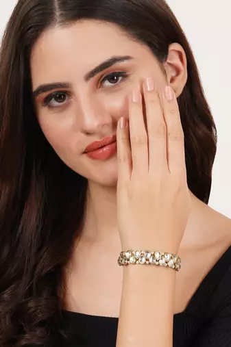 Golden double layer tilak kundan with white pearls adjustable bracelet