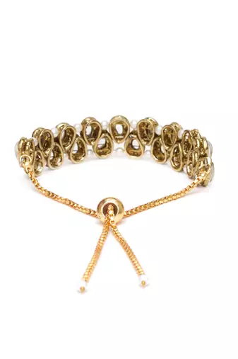 Golden double layer tilak kundan with white pearls adjustable bracelet
