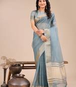 sea green organza woven zari work tassel saree