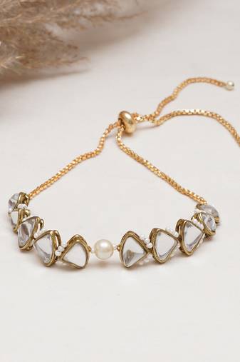 Golden triangle kundan & white pearl adjustable bracelet