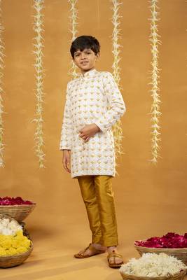 Embroidered off-white sherwani and mustard coloured pant 1