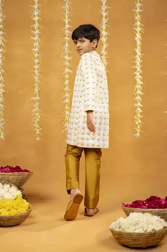 Embroidered off-white sherwani and mustard coloured pant