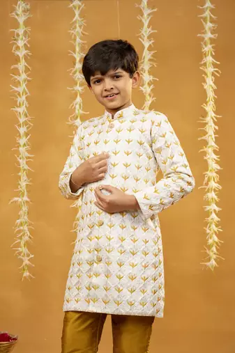 Embroidered off-white sherwani and mustard coloured pant