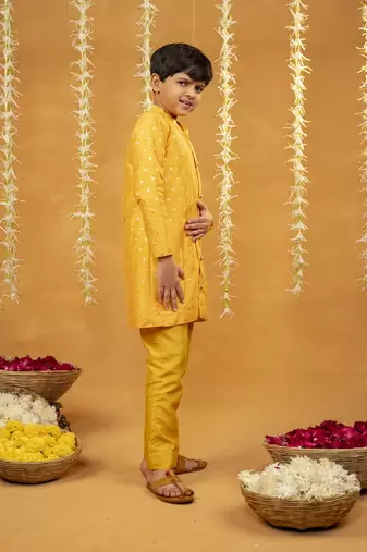 Yellow kurta with golden buti and pant