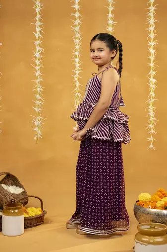 Purple bandhni and leheriya printed tie-up straps peplum top and flared palazzo