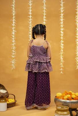 Purple bandhni and leheriya printed tie-up straps peplum top and flared palazzo 3