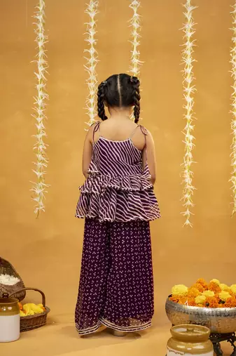 Purple bandhni and leheriya printed tie-up straps peplum top and flared palazzo