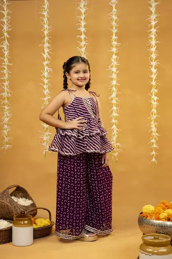 Purple bandhni and leheriya printed tie-up straps peplum top and flared palazzo