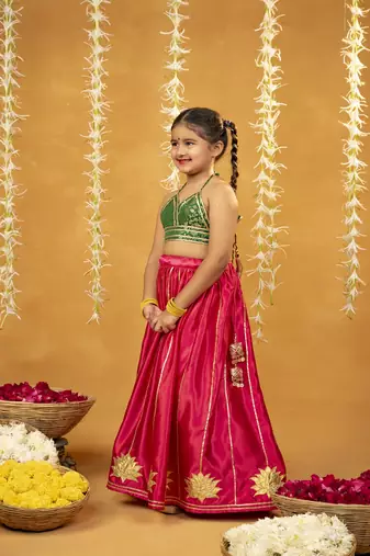 Green banarasi brocade top and golden lotus patch work lehenga