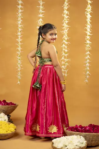 Green banarasi brocade top and golden lotus patch work lehenga